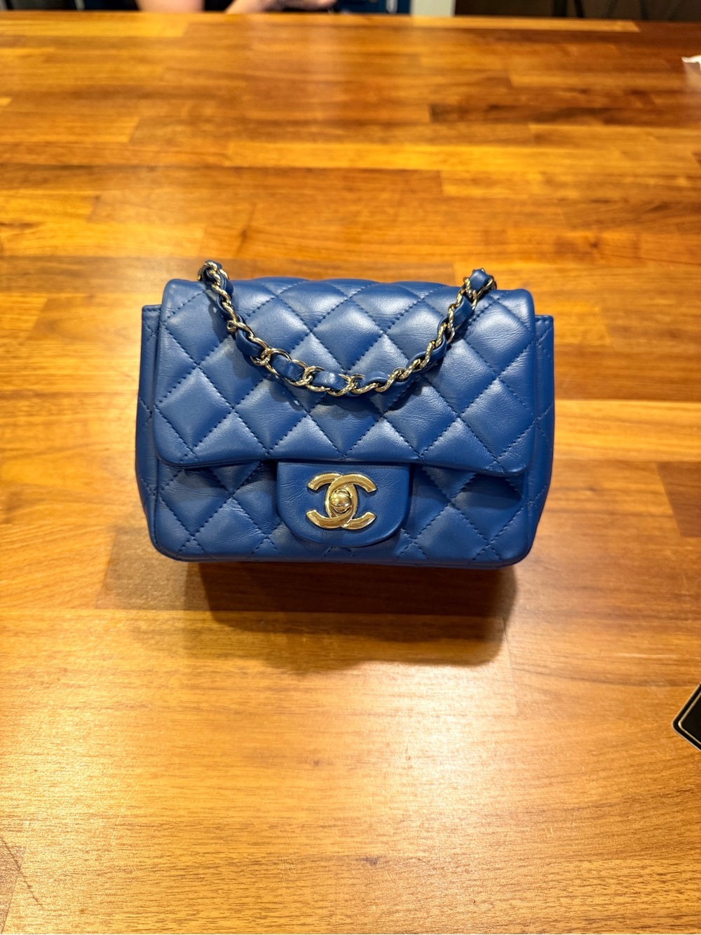 CHANEL Blue Quilted Mini Flap Bag with Gold Chain
